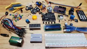 An Arduino electronics kit with sensors and a breadboard